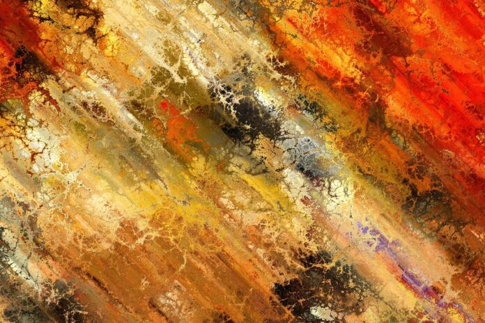 Abstract art of warm-toned and earth-toned colours mixed together.