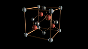 A crystal lattice (from Chemistry) over a dark background.
