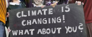 A poster demanding a response to climate change