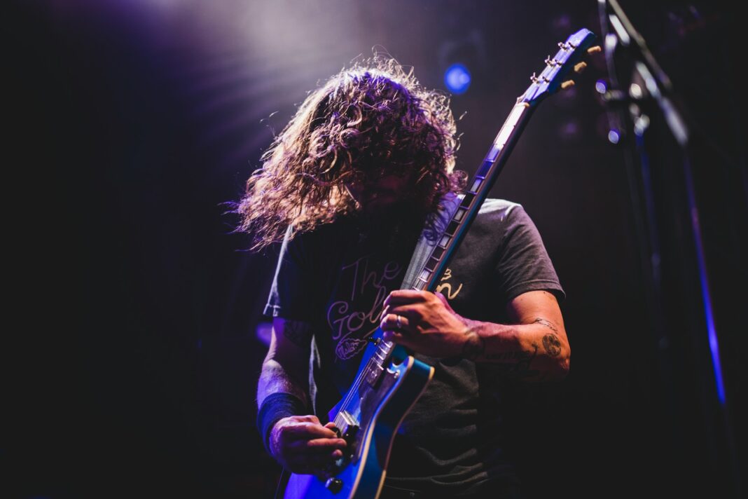 man playing the guitar