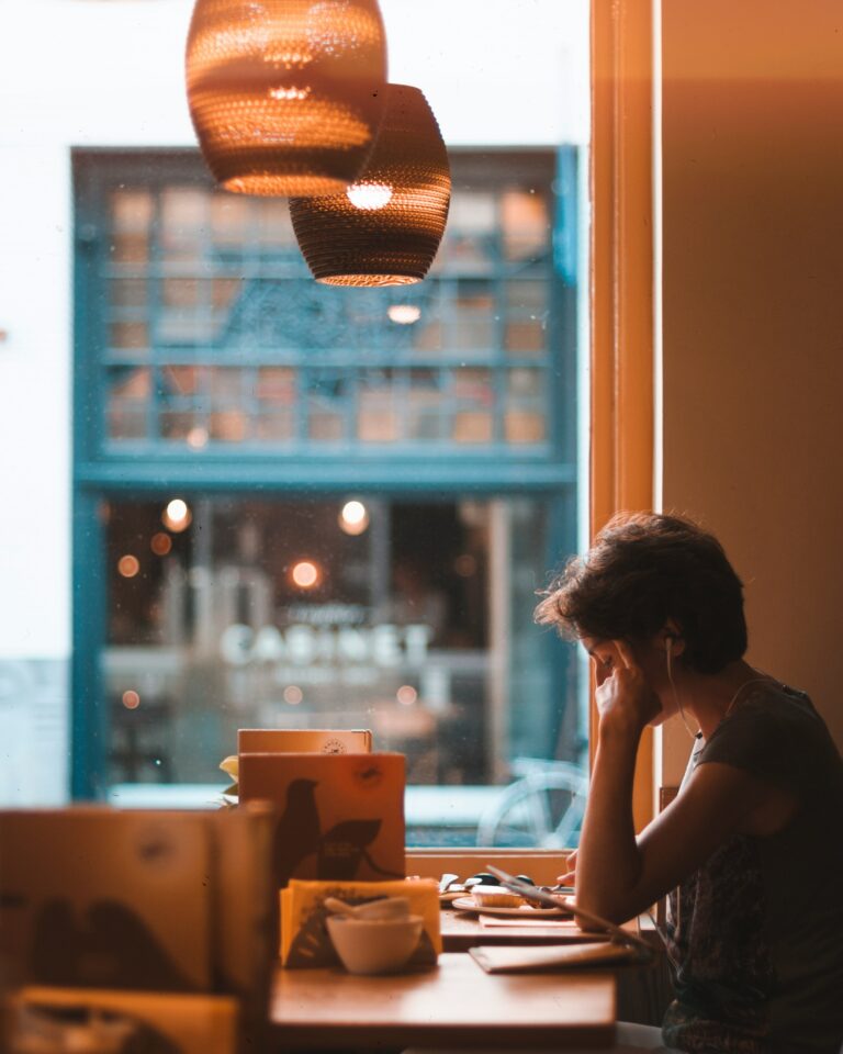guy studying in a café